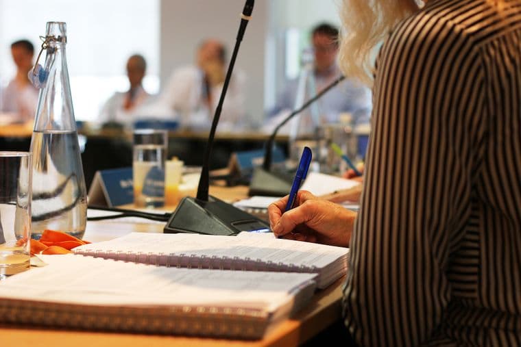 People sat in a board meeting