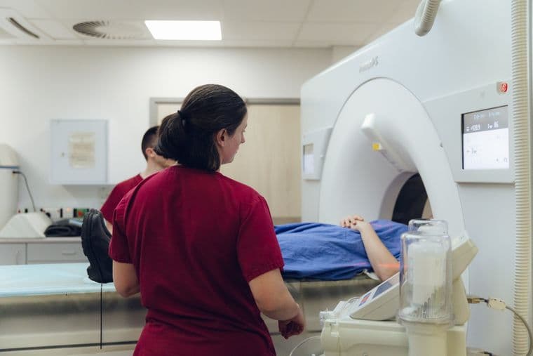 A patient entering an MRI scanner